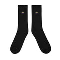 Calcetines negros de media caña con logotipo Flags de Automotive Outsiders Community bordado.